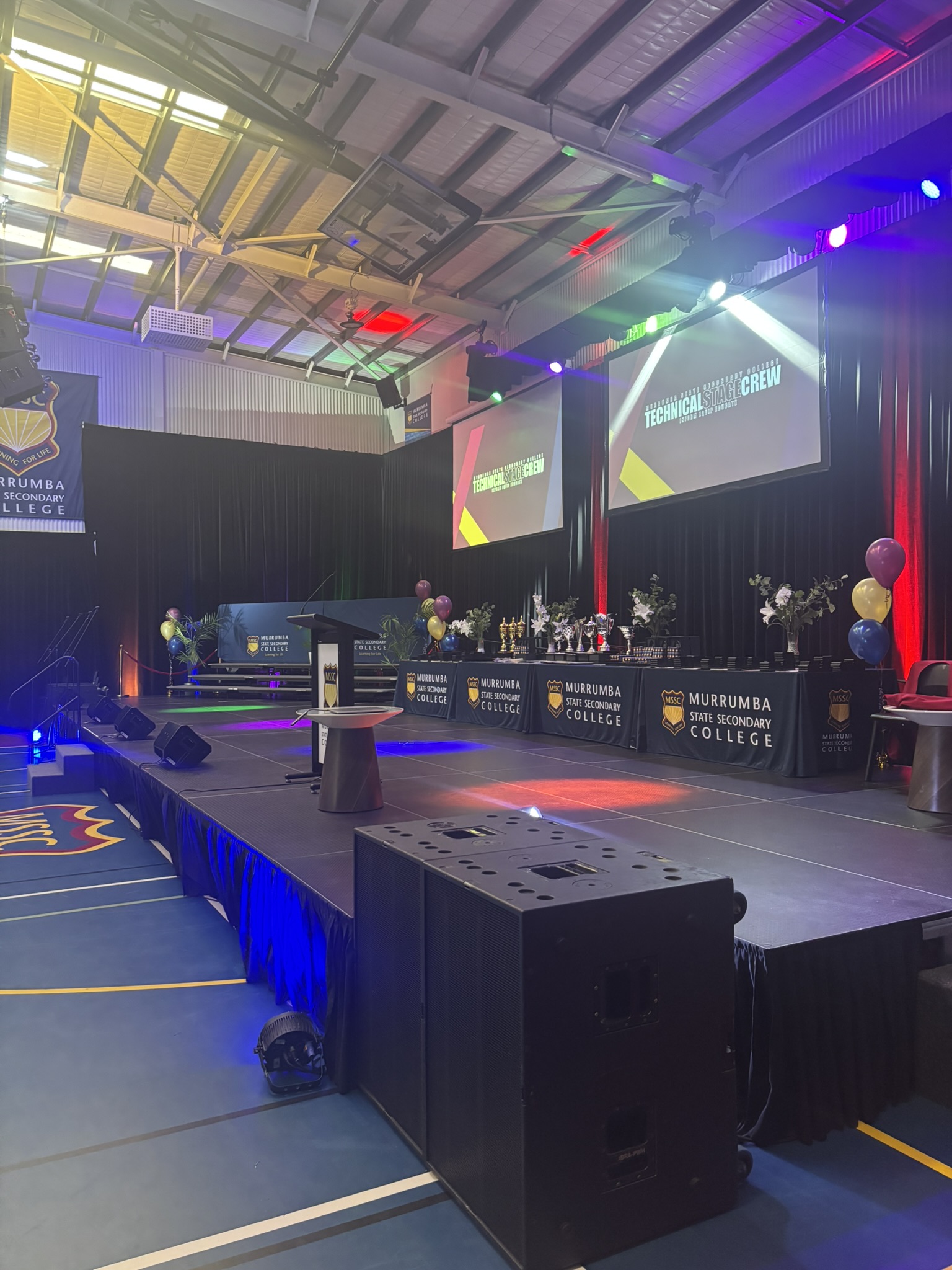 Wide shot of the dressed stage, podium and trophy table before the MSSC awards night