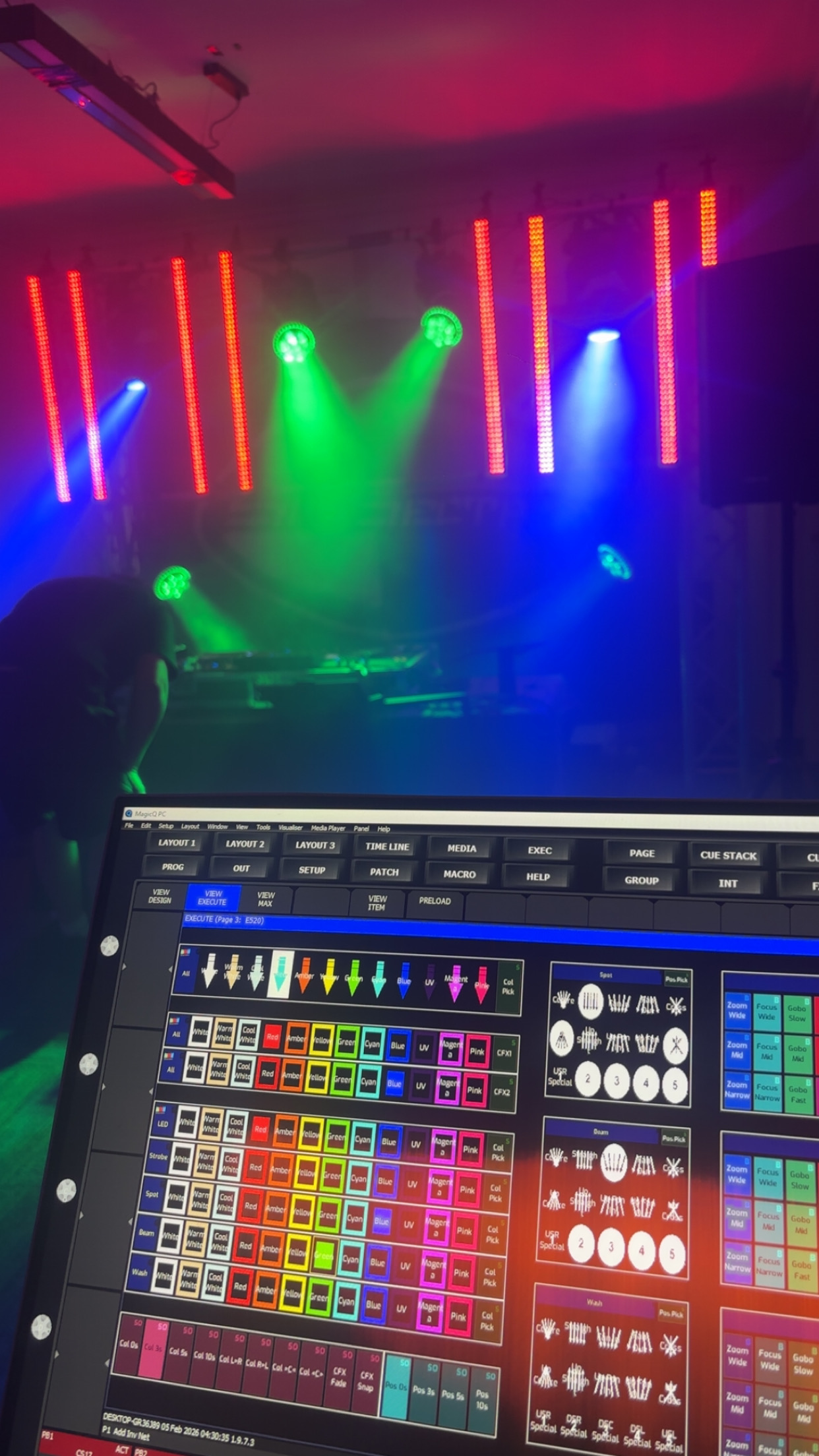 DJ silhouetted against green and blue moving-head beams in front of the SubSecta backdrop